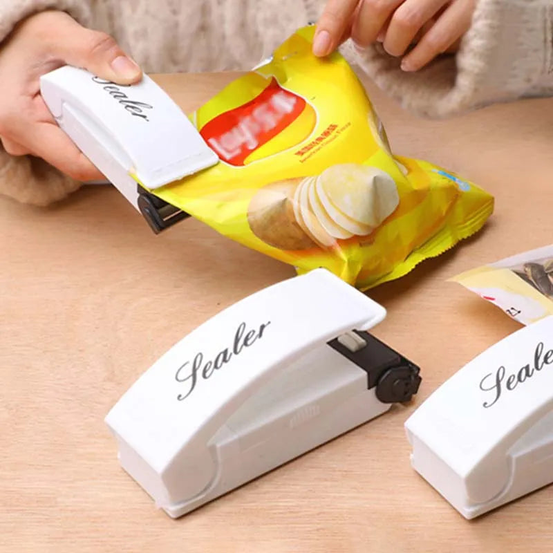Mini sealing machine small household plastic sealing machine snack moisture-proof sealing machine